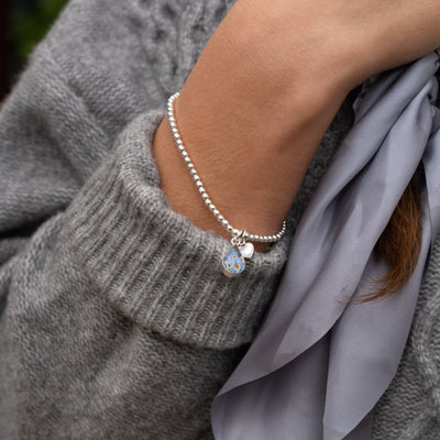 Pulsera elástica de cuentas plateadas No me olvides