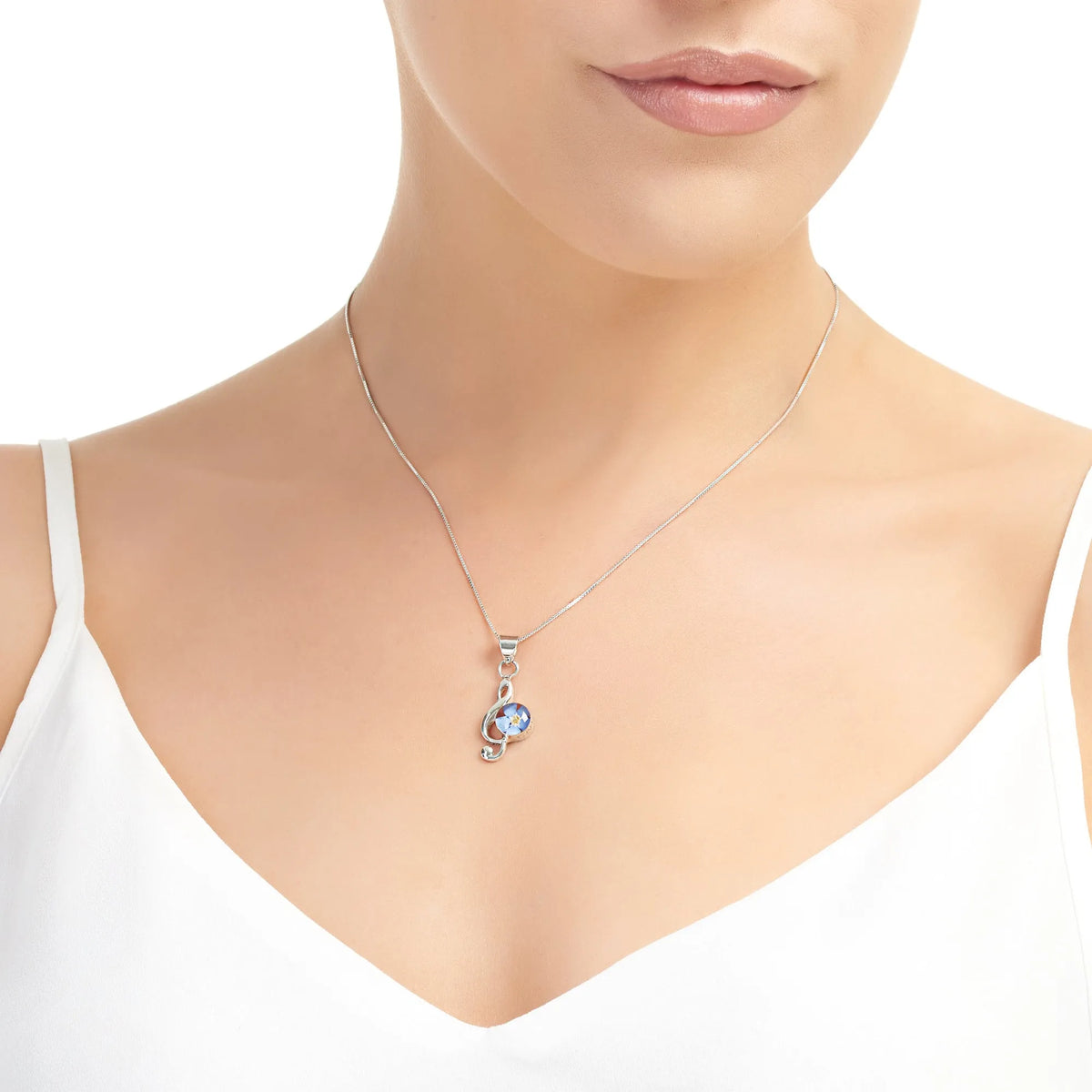 Collar con colgante de clave de sol nomeolvides
