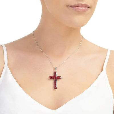 Poppy cross necklace by Shrieking Violet® Sterling silver pendant handmade with real Euphorbia milii flowers. Perfect jewellery gift for Christmas.